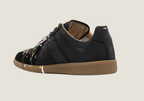 MM  nubuck leather and velour featuring a paint splatter design.